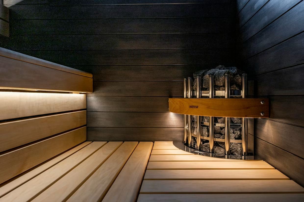 Harvia Glow Corner corner-mounted sauna heater with metallic finish